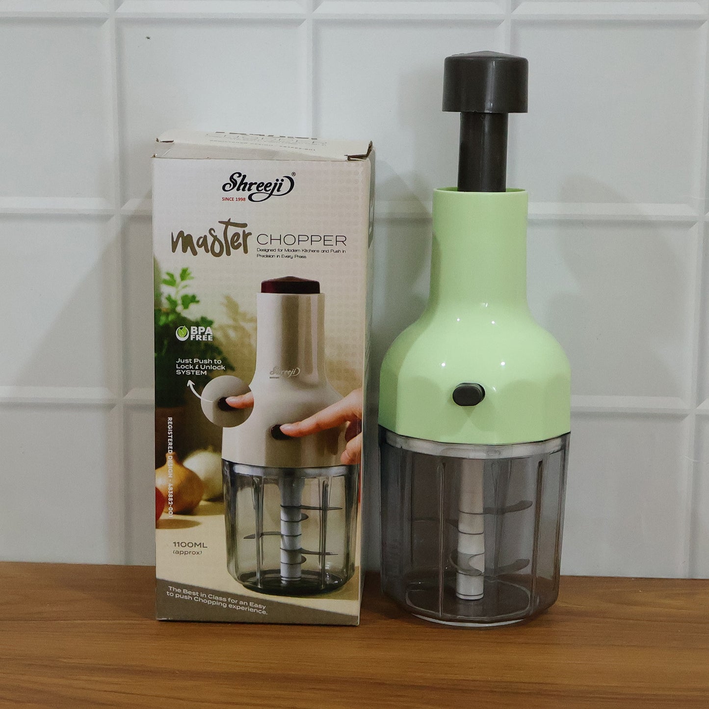 Vegetable chopping tool with storage bowl