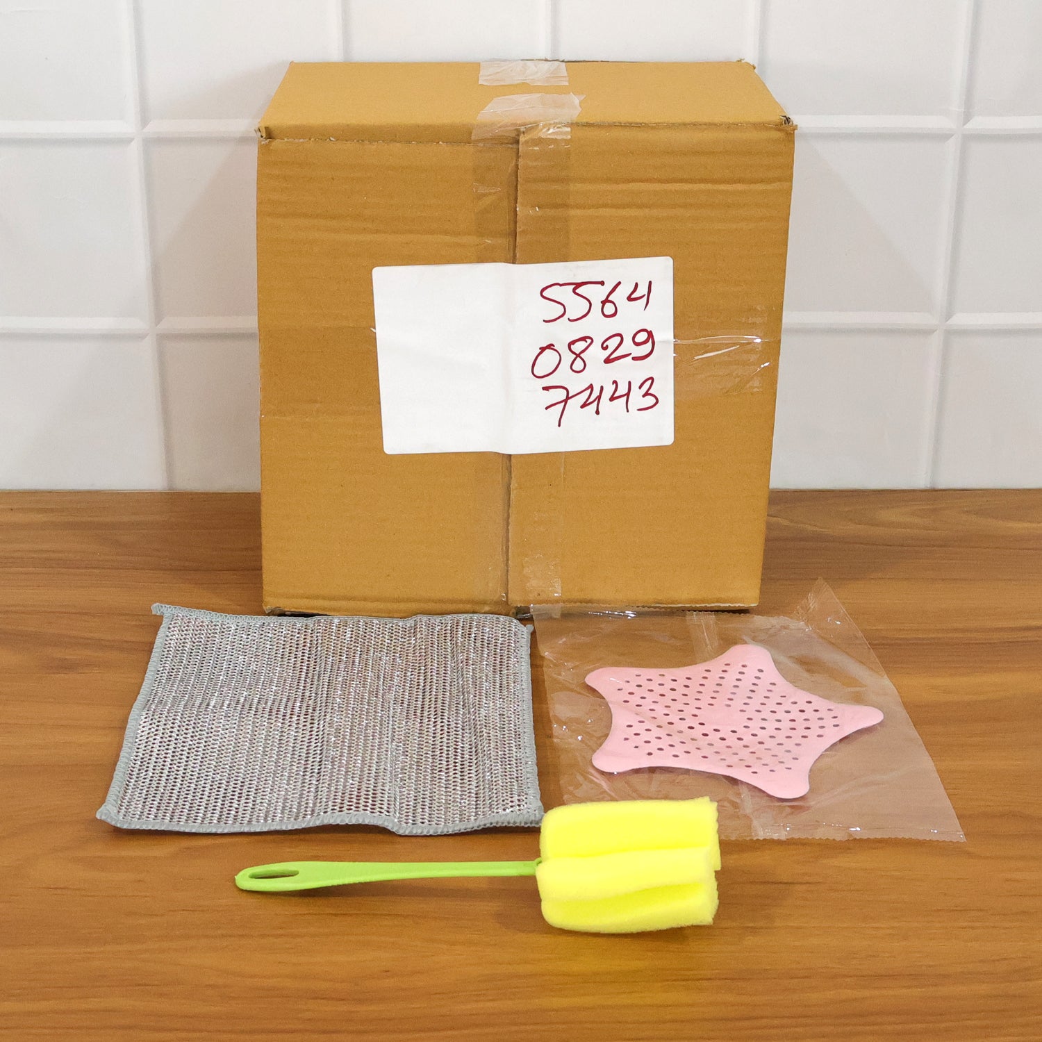 Sink strainer and cleaning brush for kitchen use