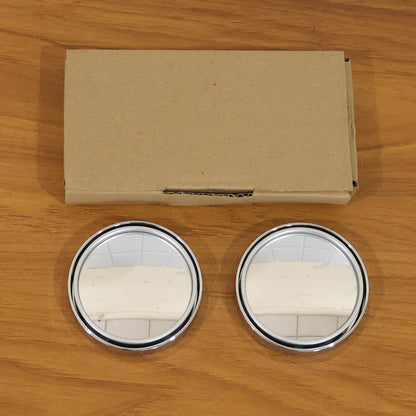 Installation of silver round blind spot mirror on car side mirror