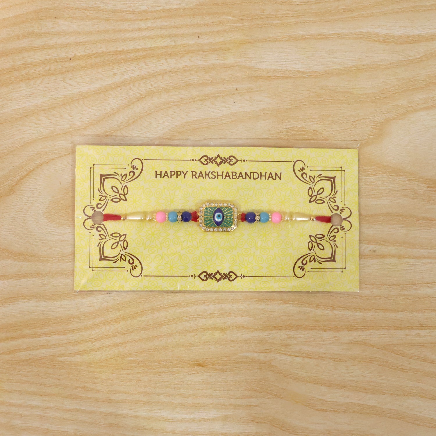 Colorful rakhi showcasing evil eye symbol and bead embellishments