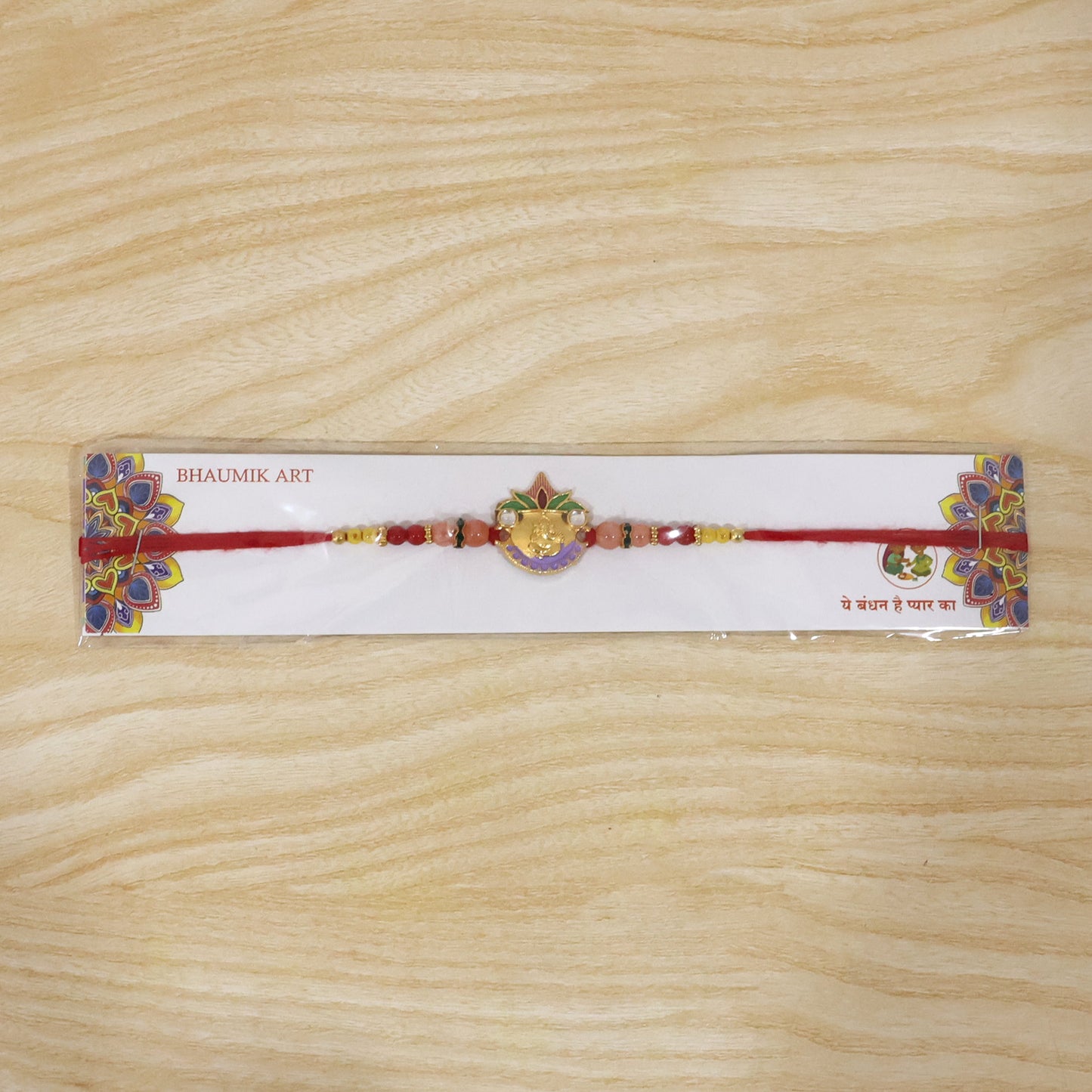 Colorful beads and thread detail on Rakhi