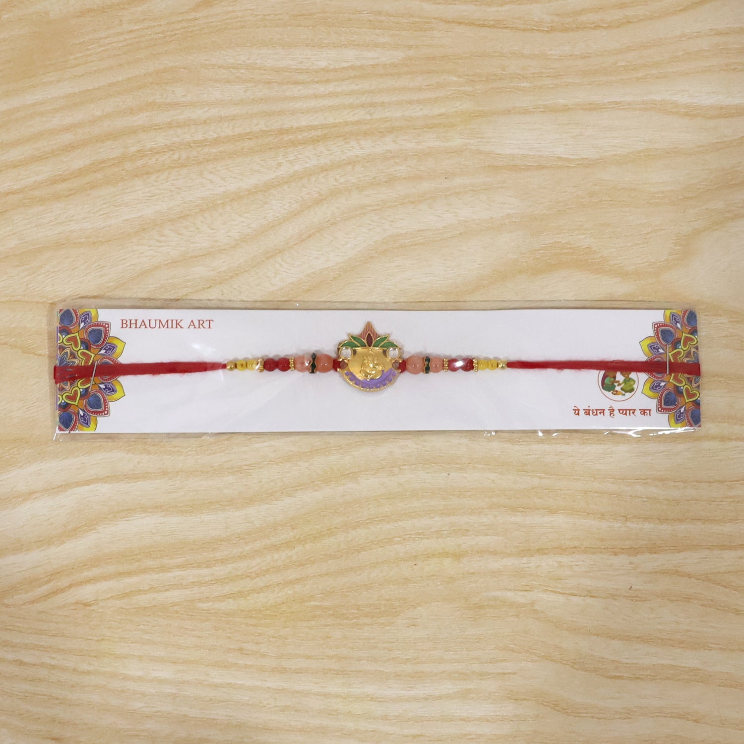 Colorful beads and thread detail on Rakhi