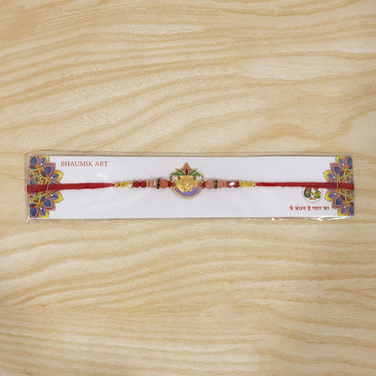 Colorful beads and thread detail on Rakhi