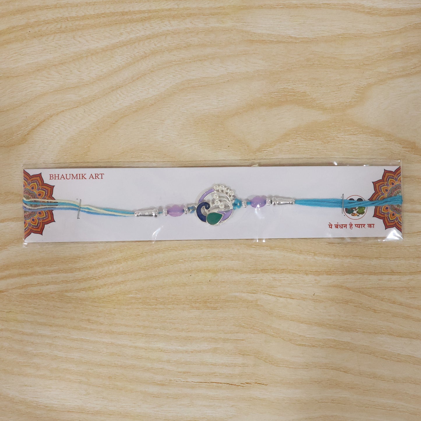 Detailed view of Designer Peacock Motif Rakhi