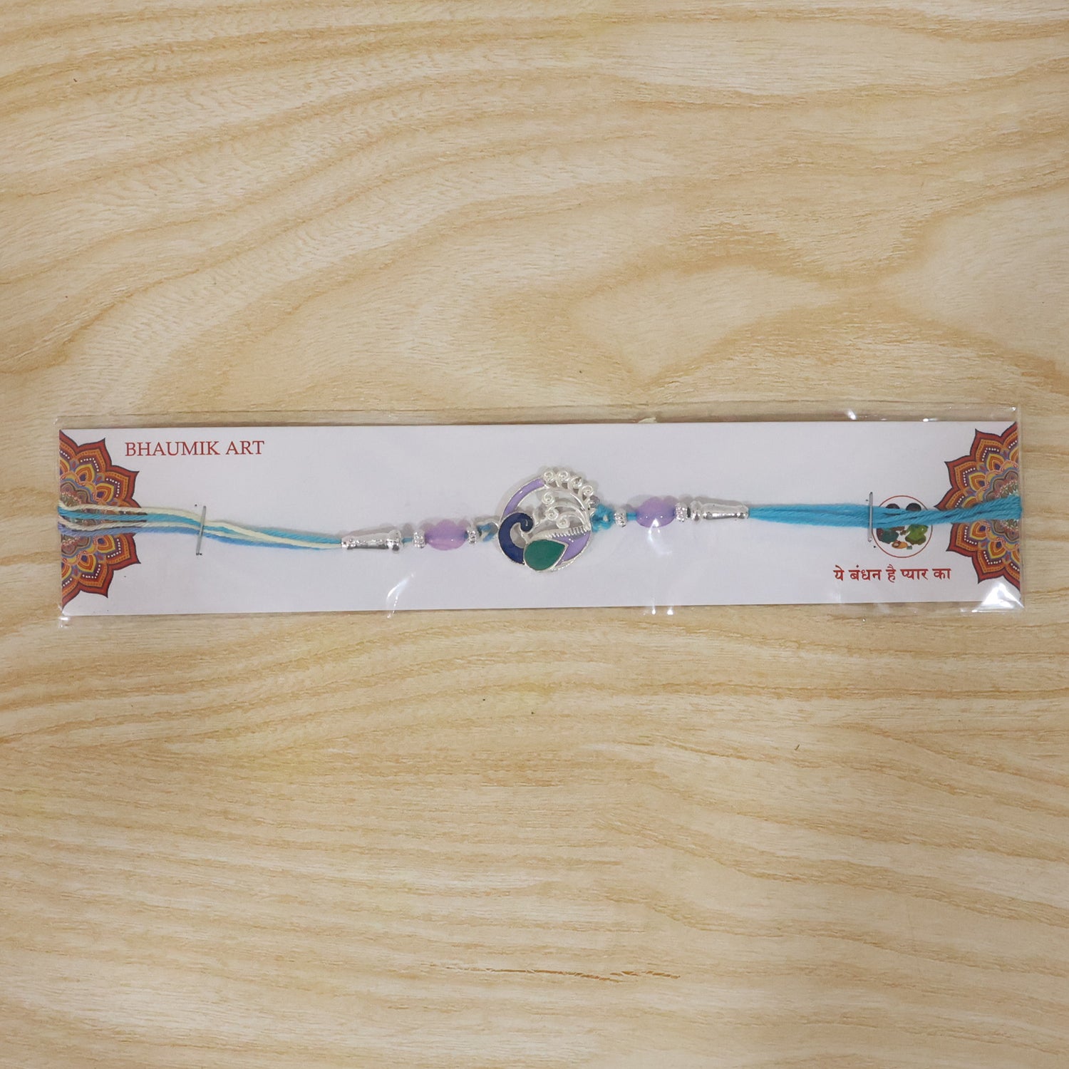 Detailed view of Designer Peacock Motif Rakhi