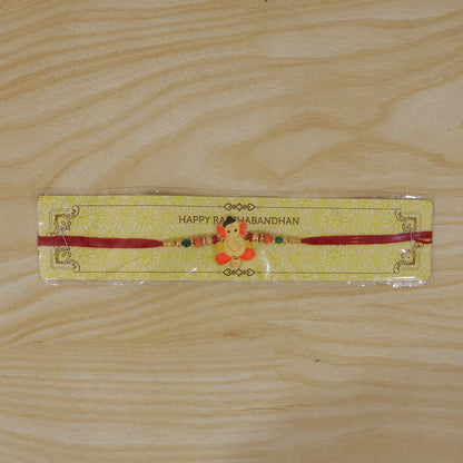 Lord Ganesha Rakhi with vibrant beads and soft thread