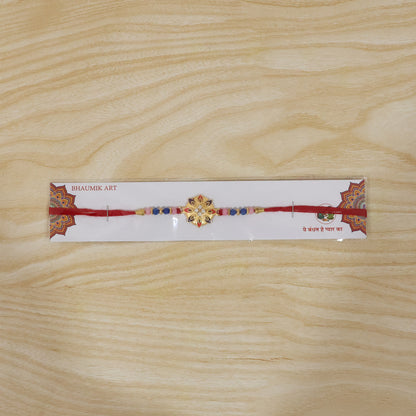 Decorative floral rakhi with intricate beadwork
