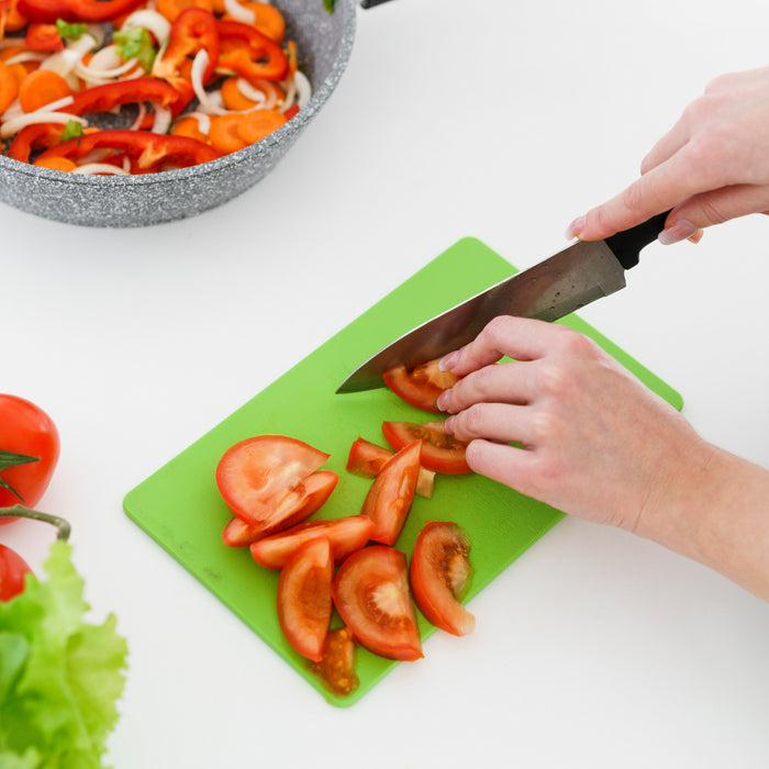 Plastic cutting board and steel knife set, showing different angles