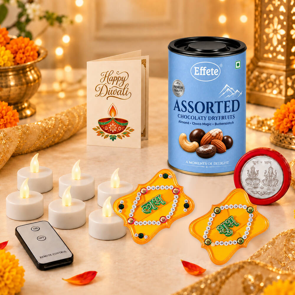 A Diwali gift set with assorted dry fruits, LED tealights, and Shubh Labh decorations is displayed on a table with warm,