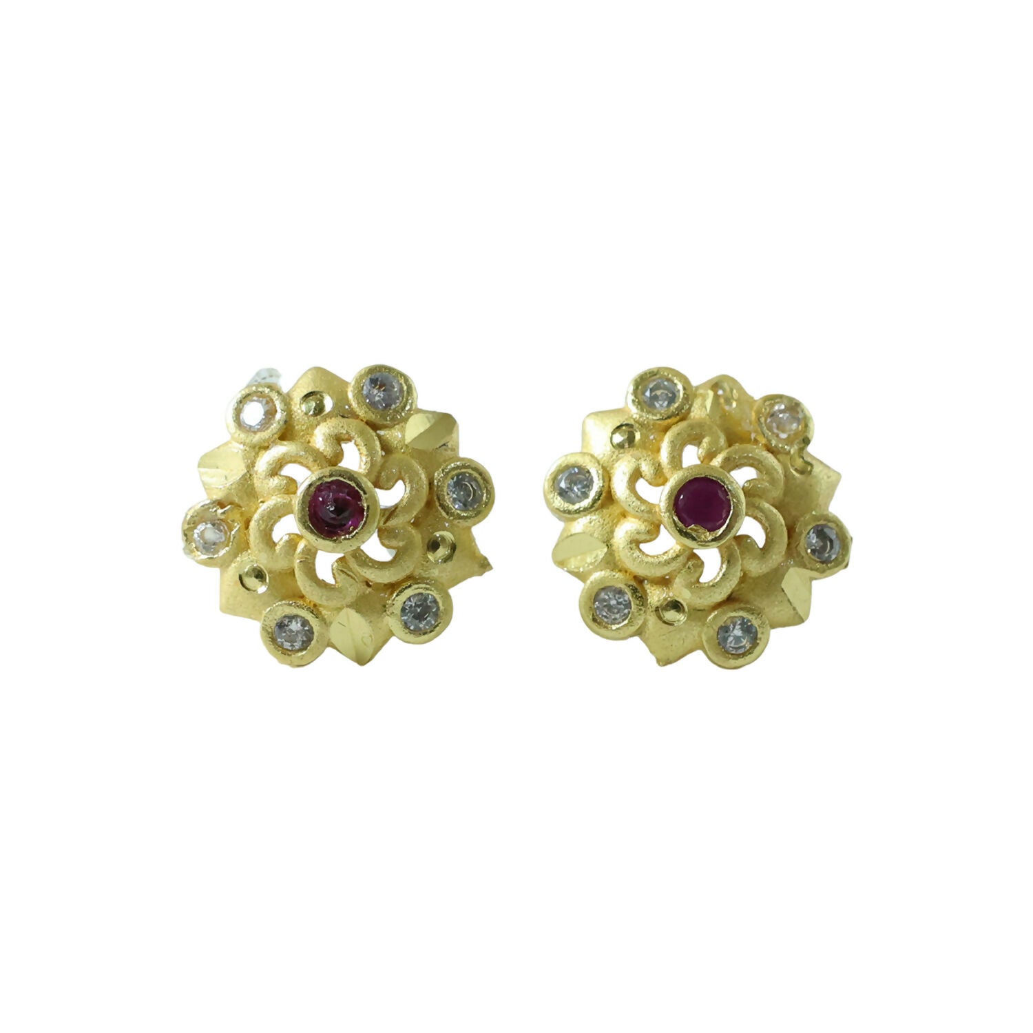 Detailed view of floral gold earrings with shimmering stones