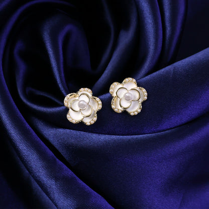 Pearl heart drop earrings side angle with gold-tone finish