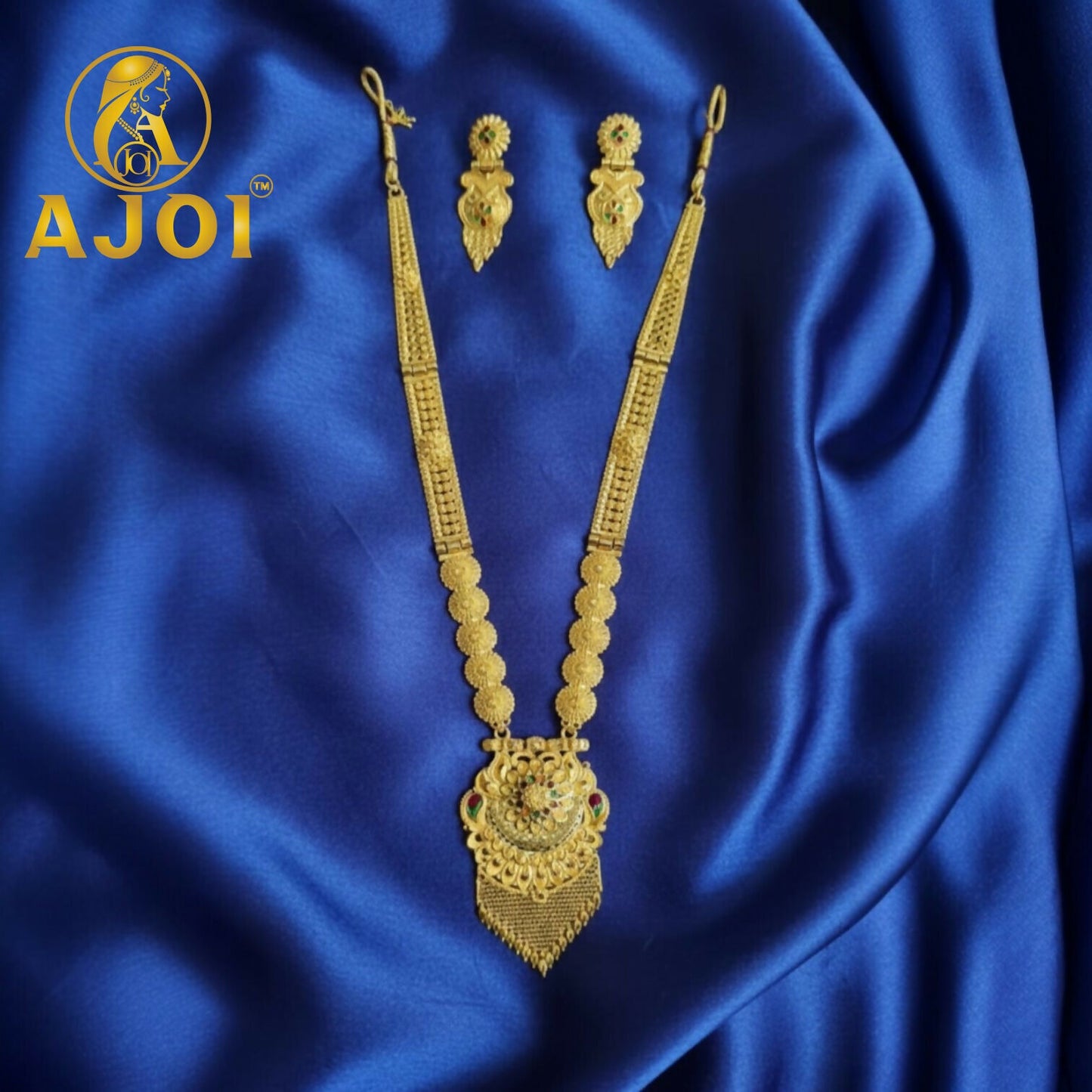 Royal Glow necklace set showing gold-tone chain and mesh tassel fringe