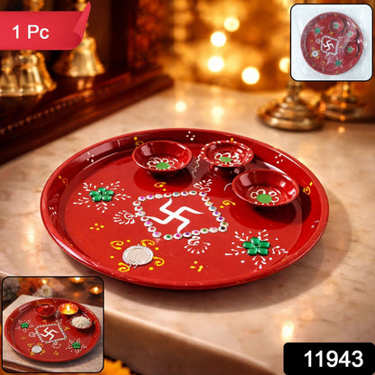 Close-up of decorative floral and paisley patterns on Ganesha pooja thali