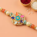 Multicolor Floral Kundan Pendant Rakhi with Pearl and Orange Beads