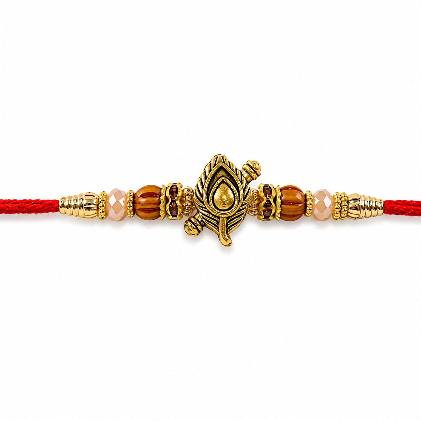 Peacock Paisley Golden Rakhi with Leaf Style Centre, Red Thread and Pearl Accents