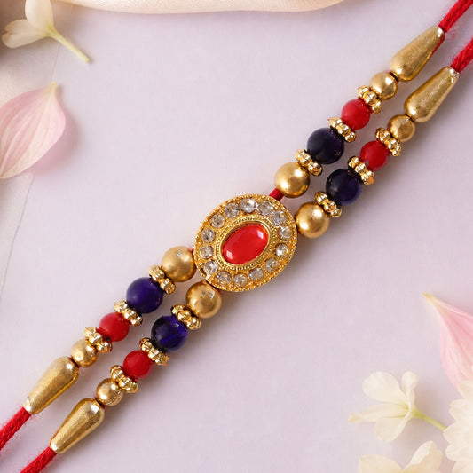 Red Blue Beaded Rakhi with Ruby Center and Rich Traditional Festive Gift Styling