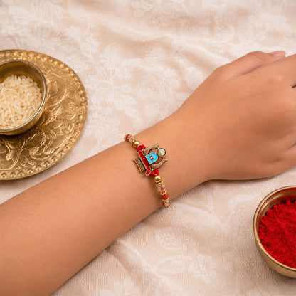 Shivling Pendant Rakhi with Blue Enamel Accent and Rudraksha Beads