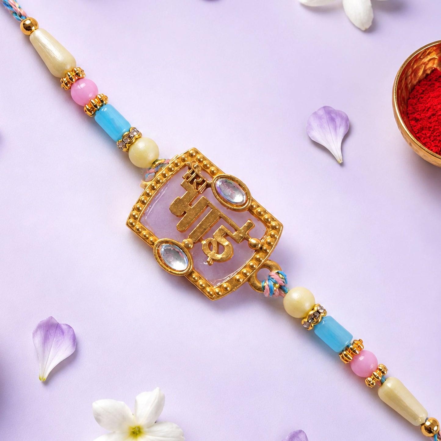 Bhai Script Pendant Rakhi with Lilac Stone and Kundan Accents