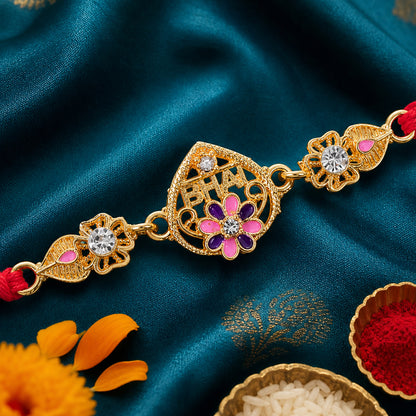 Festive Rakhi featuring Ornate Floral Charm, pearl accents and chain look for Gift