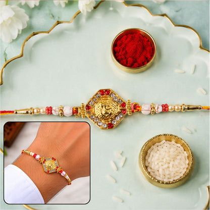 Ganesh Rakhi with Golden Beads and Red-Yellow Thread