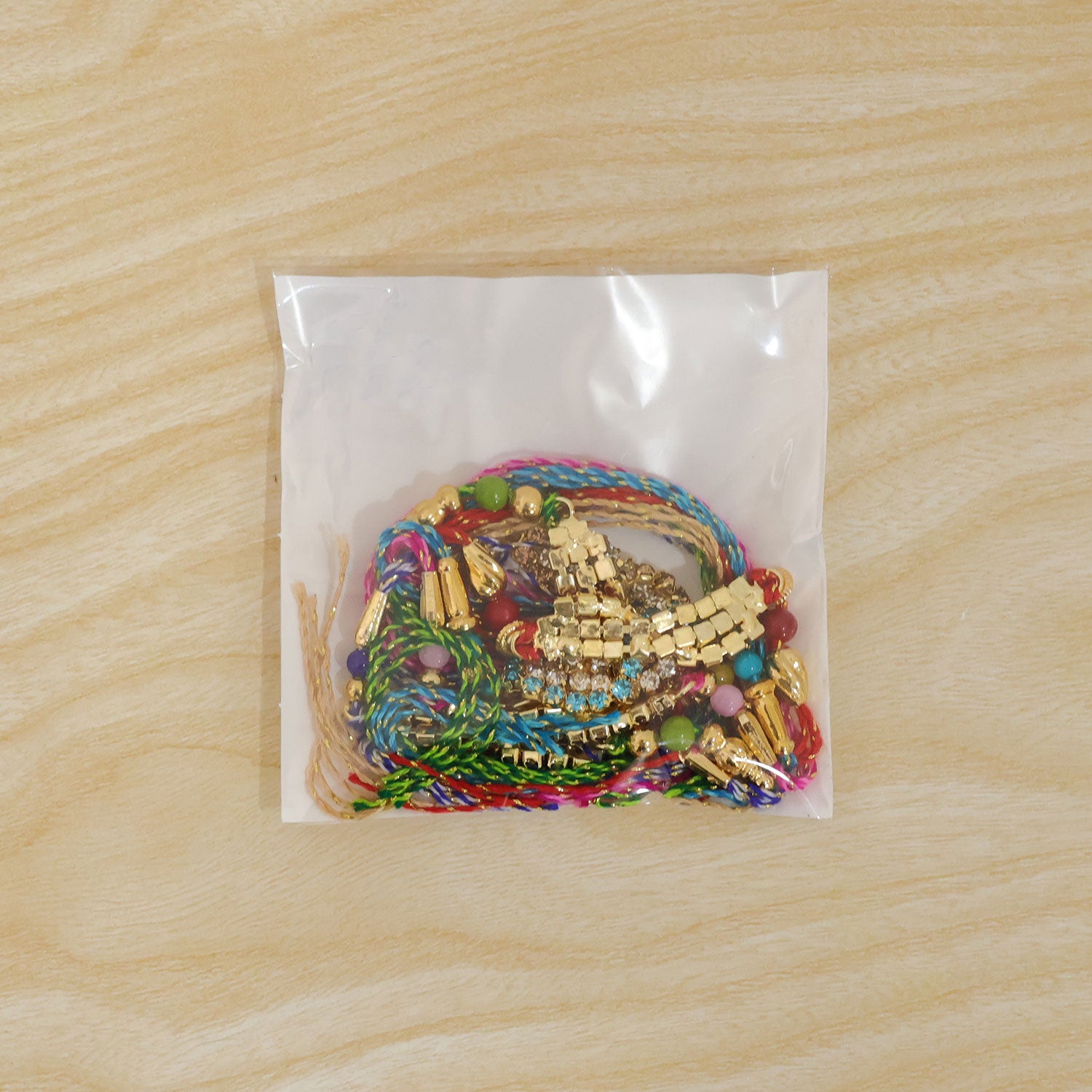 Wave Shaped AD Stone Rakhi for Brother with Beads (Pack of 6)