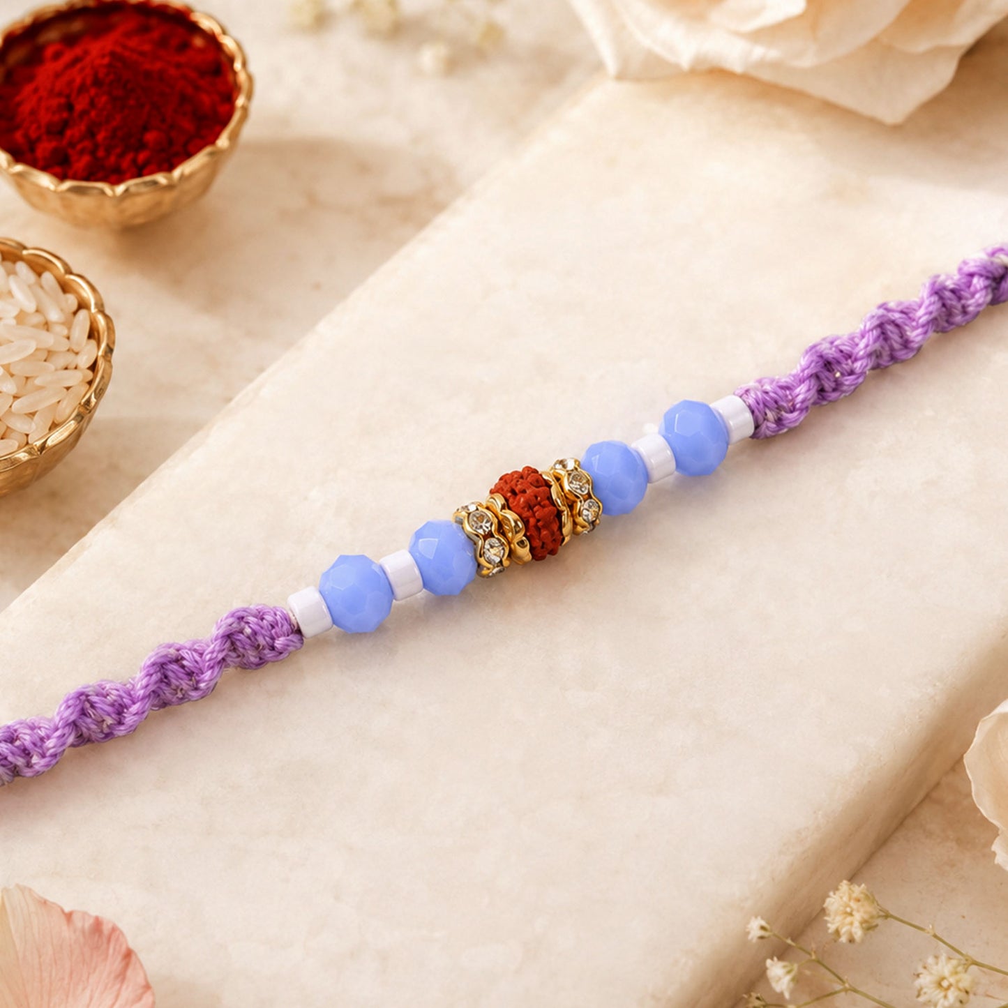 Sparkling Pearl Stone Rakhi with Colorful Thread and Premium Festive Beauty