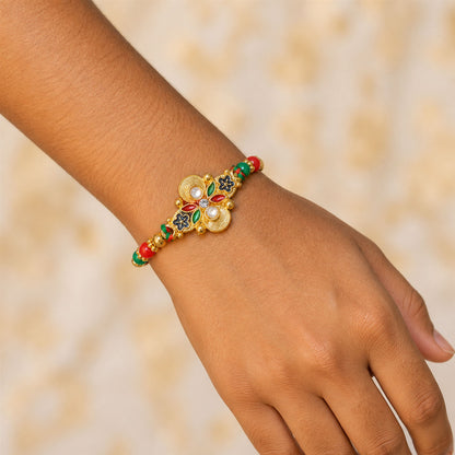 Multicolor Floral Kundan Pendant Rakhi with Red and Green Beads