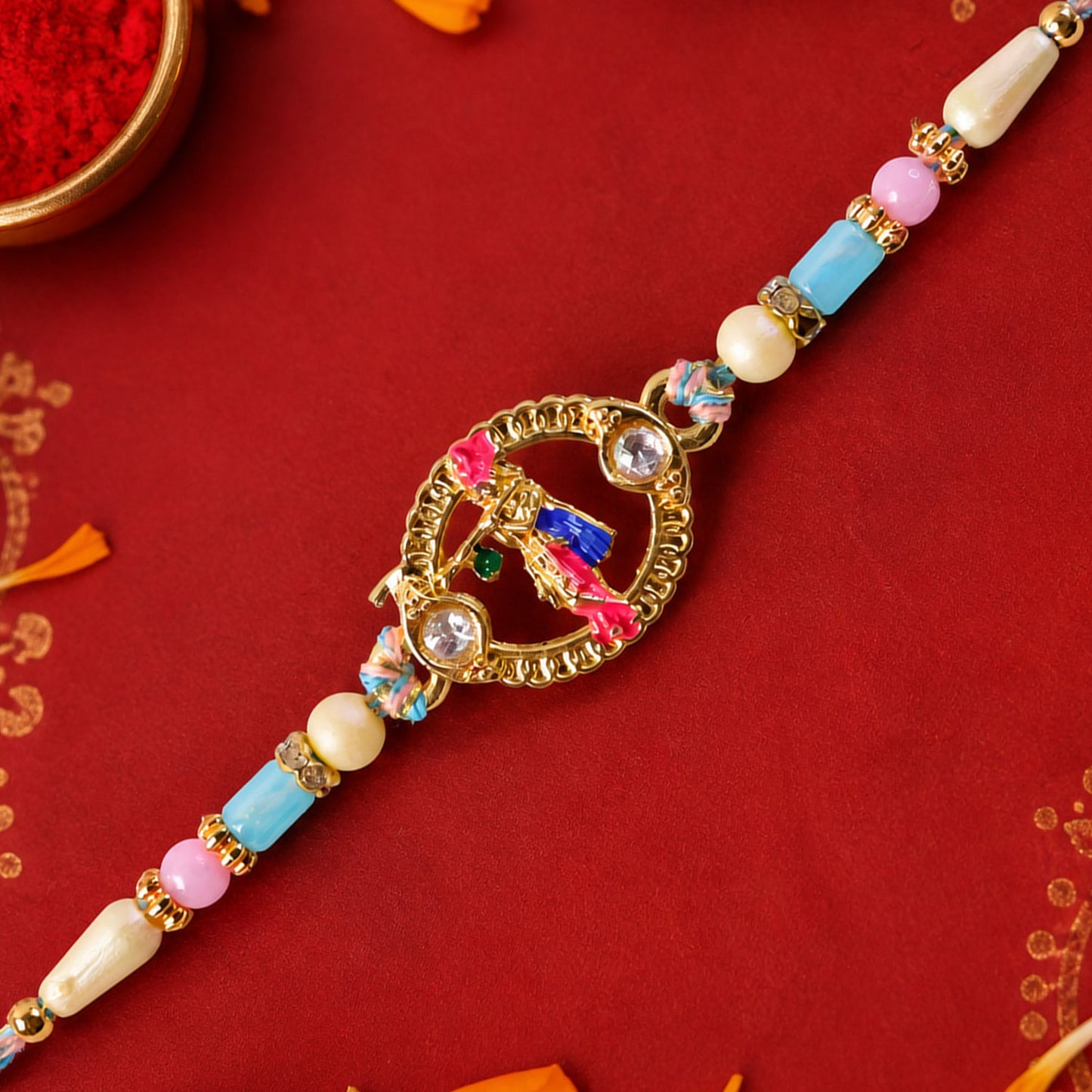 Colorful Circular Charm Rakhi with Pink Blue Beads and Festive Brother Gift Appeal