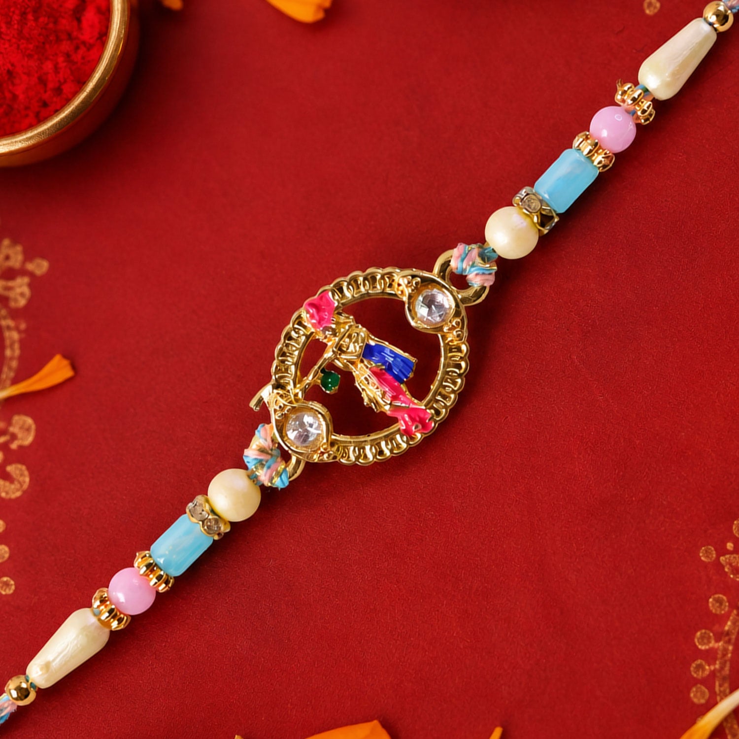Colorful Circular Charm Rakhi with Pink Blue Beads and Festive Brother Gift Appeal