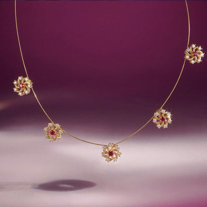 Ruby Floral Station Necklace with Diamond Detailing and Elegant Gold Chain Design