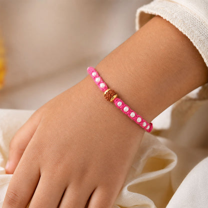 Pink-White Braided Rakhi with Natural Rudraksha Bead Pendant