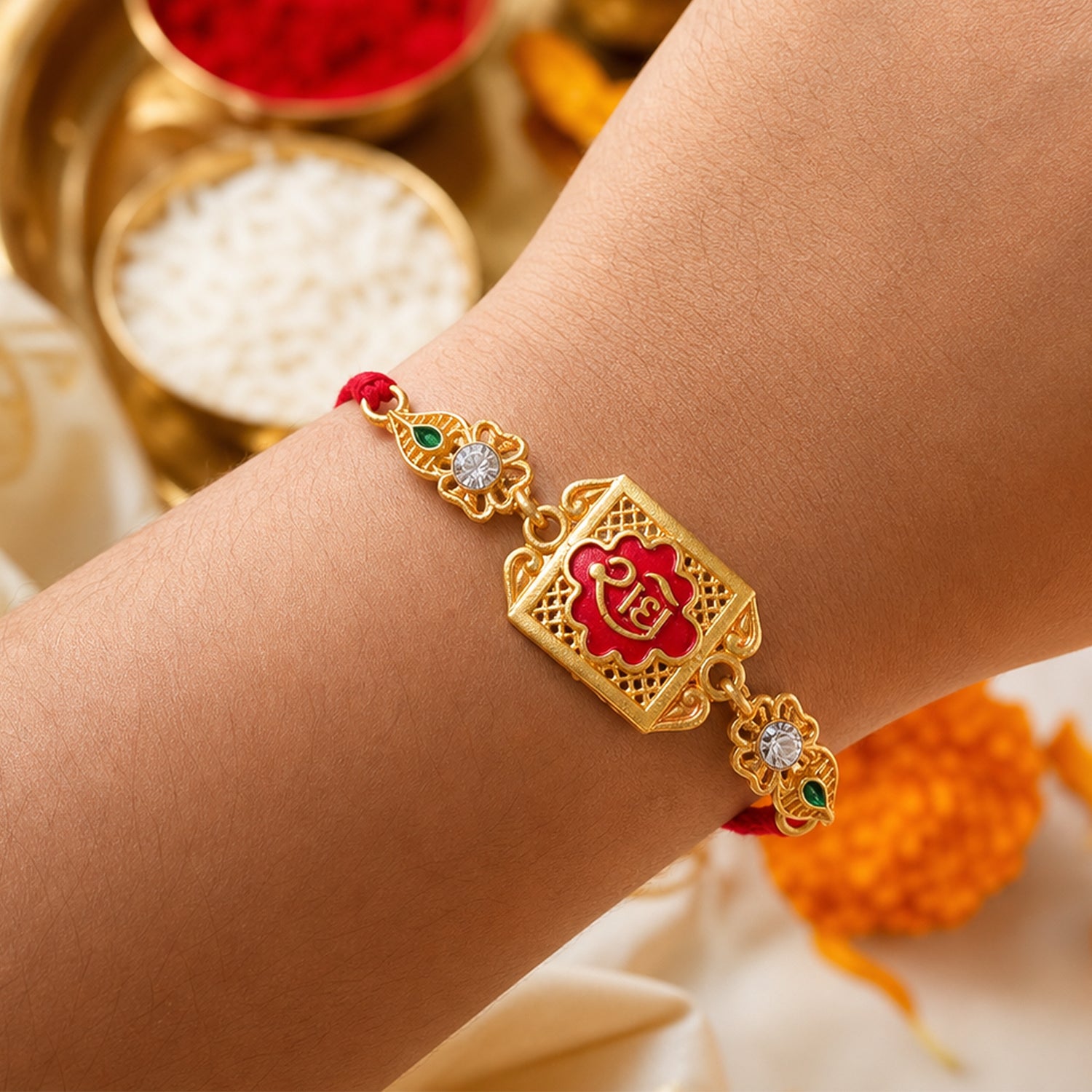 Gold-Toned Radhe with Red Enamel, Crystal Accents & Designer Red Thread