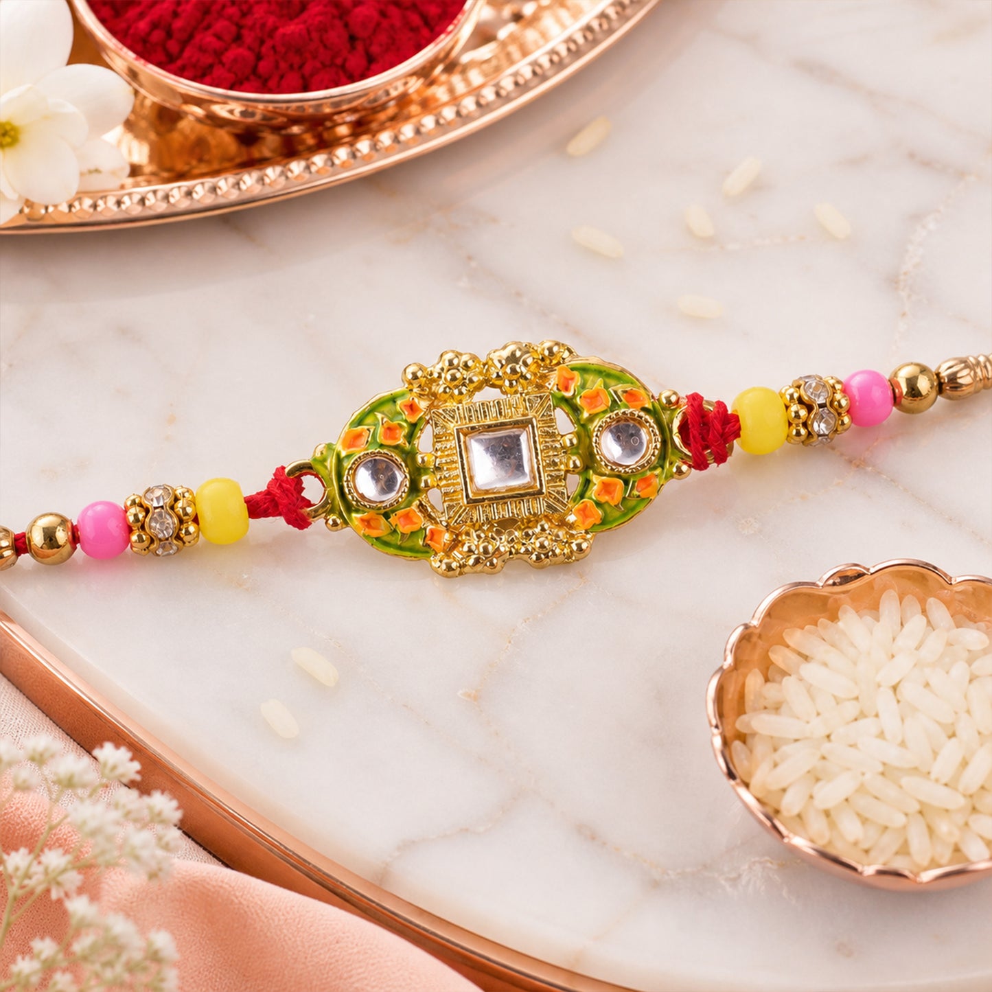 Elegant Rakhi with Square Red Gem Charm and gift finish in ornate look for Gift Use