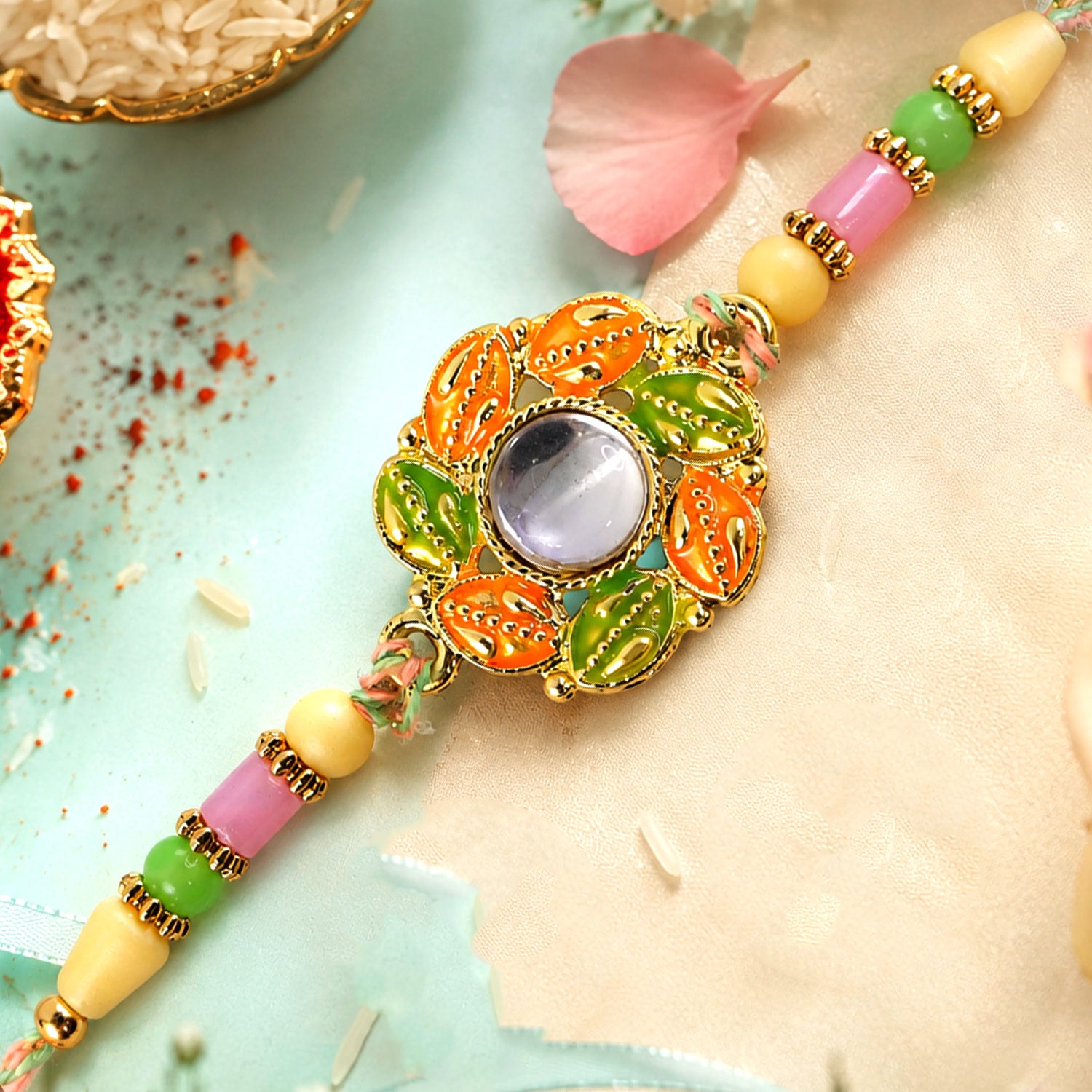 Gold Leaf Kundan Pendant Rakhi with Rudraksha Beads