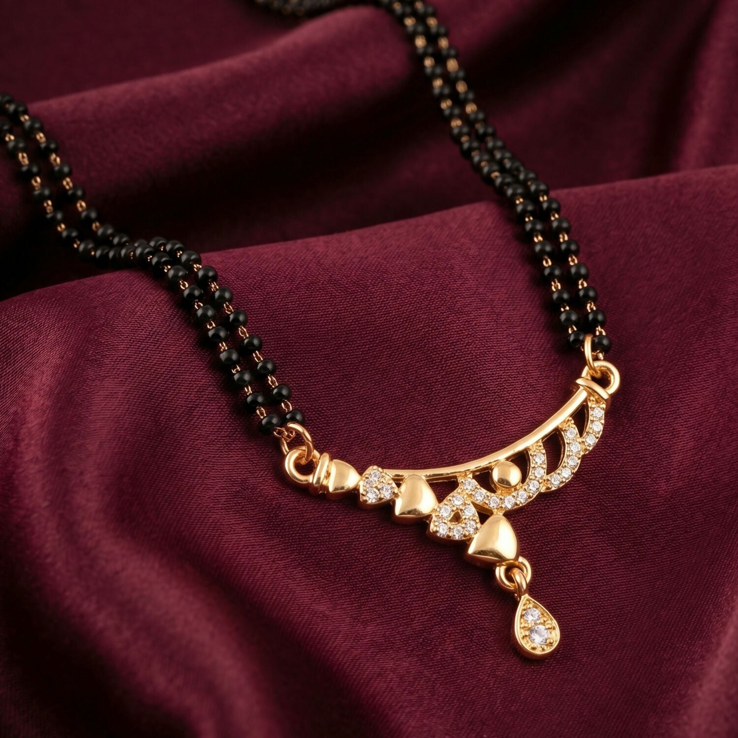Rose Gold Finish Triple Strand Heart Charms & CZ Bar Mangalsutra with Teardrop Drop