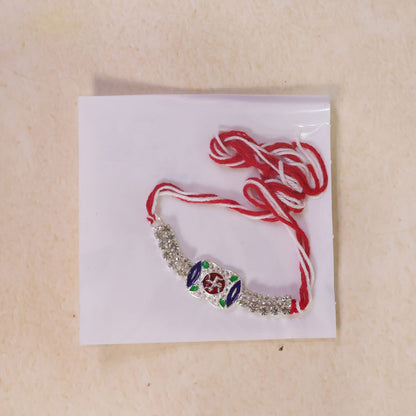 Premium Rakhi showcasing Swastik Charm, gold trims and chain look for Product Display