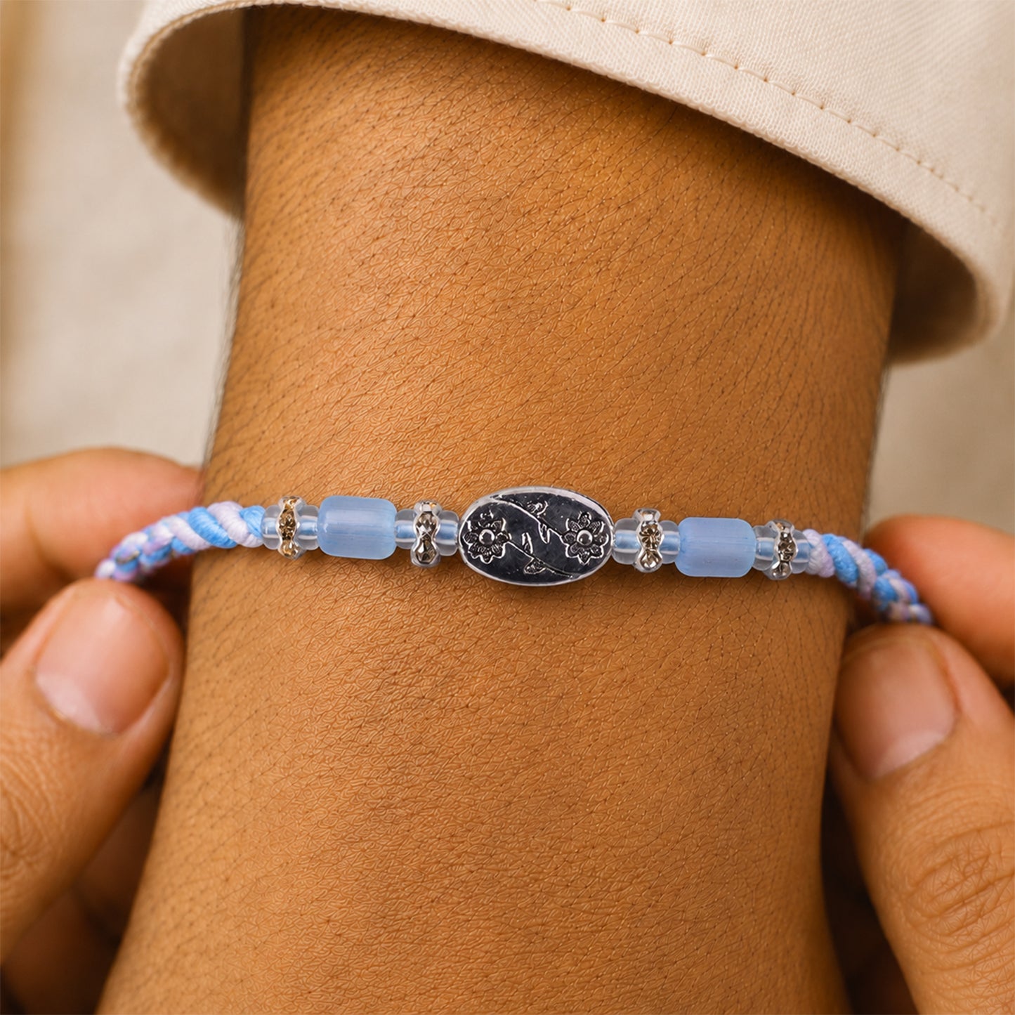 Blue Silver Stone Rakhi with Elegant Bracelet Style and Premium Festive Shine