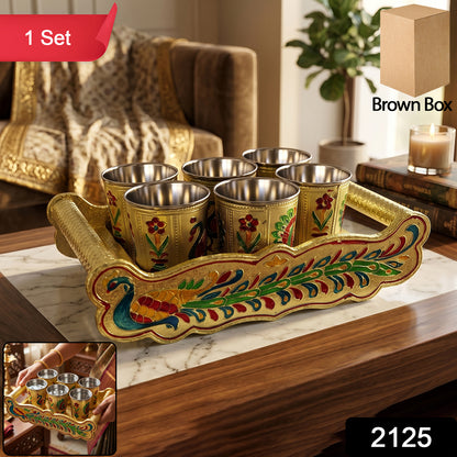 Close-up of Peacock design on glass tray set