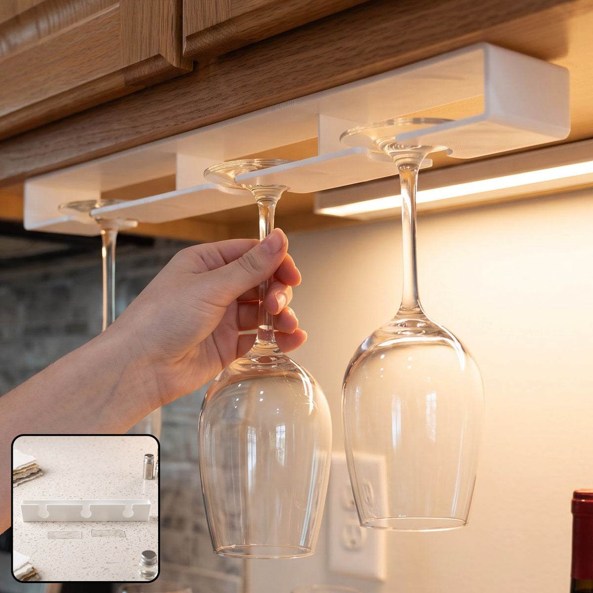 Under shelf wine glass hanger installed below cabinet