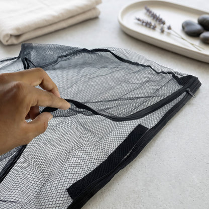 Mesh zipper storage bag closure detail