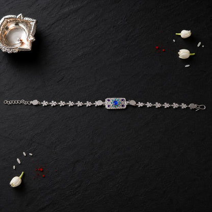 Rectangle Silver Studded Multicolor Enamel Floral Chain Rakhi