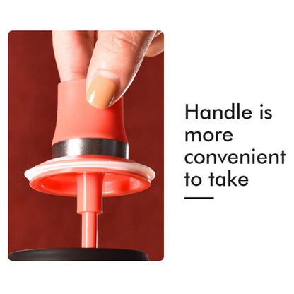 oil dispenser bottle brush handle close up