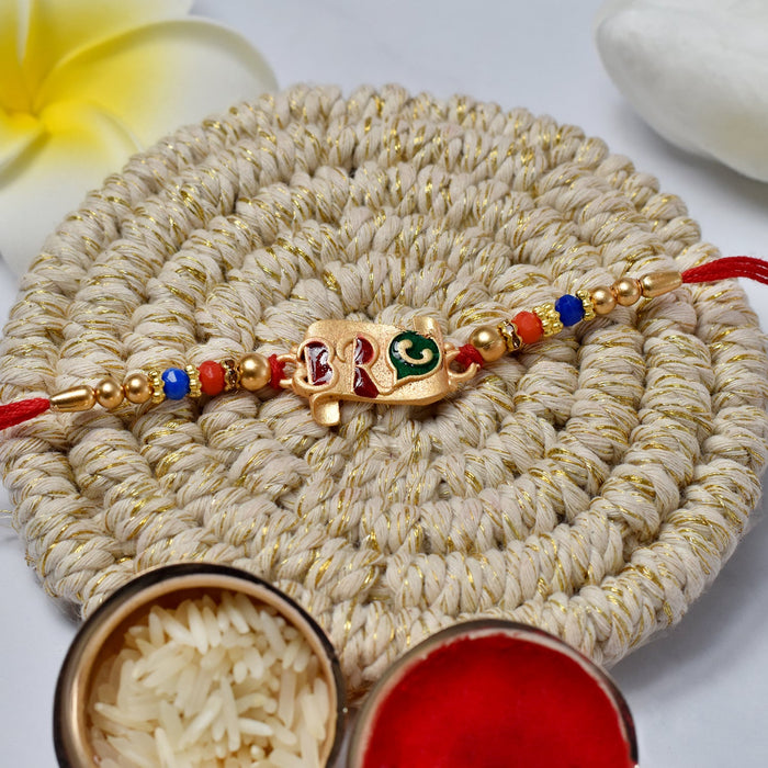 "BRO" Rakhi with Red & Gold Thread