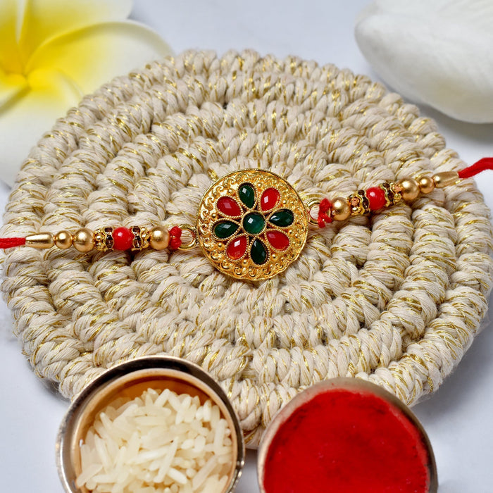 Traditional Gold/silver Rakhi with Gemstones