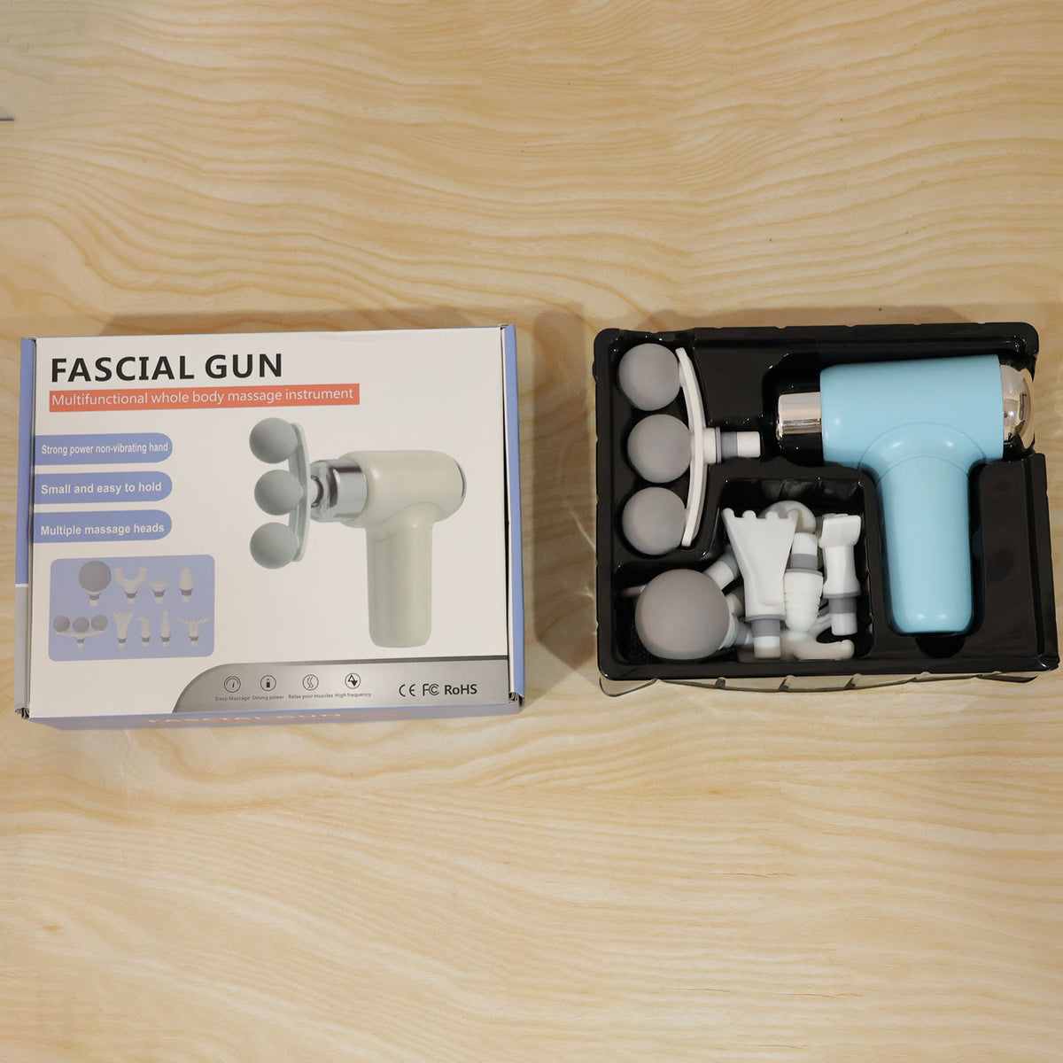 Person using the mini massager gun on their arm