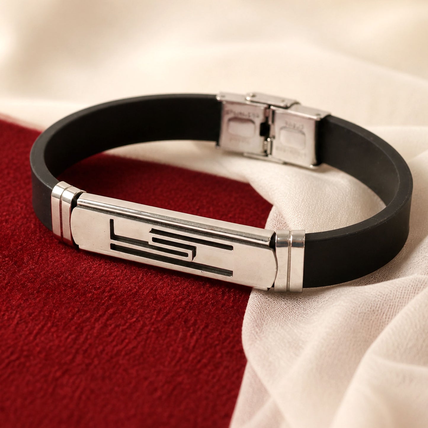 Geometric Band Rakhi with Black Strap and Silver Symbol Plate for Raksha Bandhan