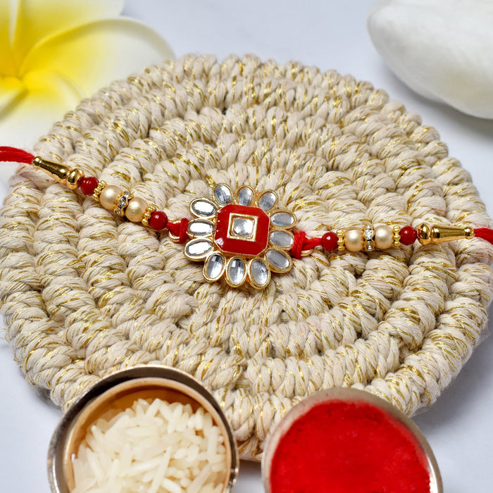 Stylish Pearl and Gold Rakhi