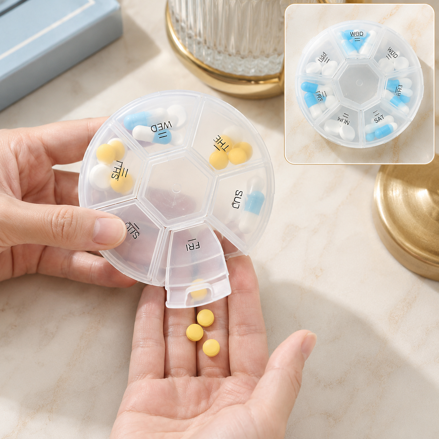 Hands dispensing yellow pills from a clear 7-day pill organizer with blue and yellow pills inside.