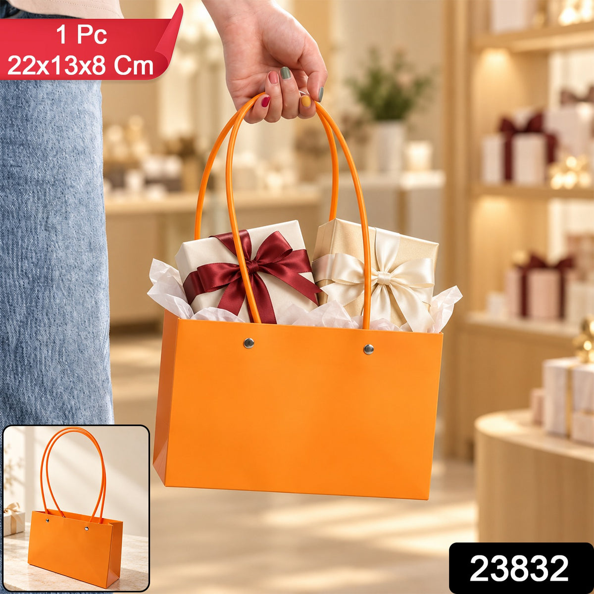 A hand holds an orange gift bag with two wrapped presents, displaying size and product number overlays.