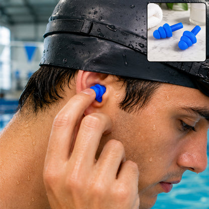 A man in a black swim cap inserts a blue silicone earplug into his ear, with a small inset showing the earplugs.